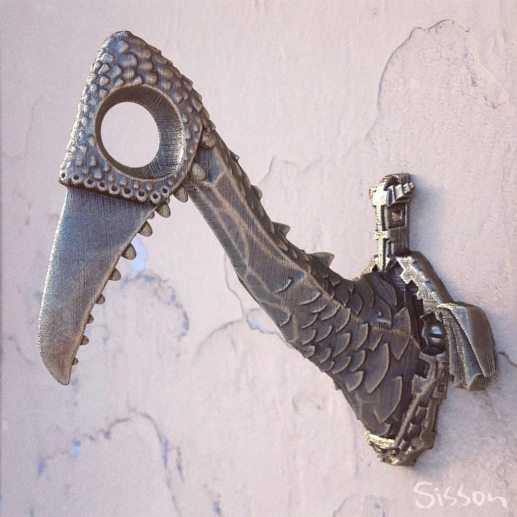 A long-necked creature rendered as a wall hook.