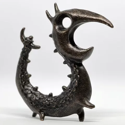The Dragon Opener photographed against a light background.