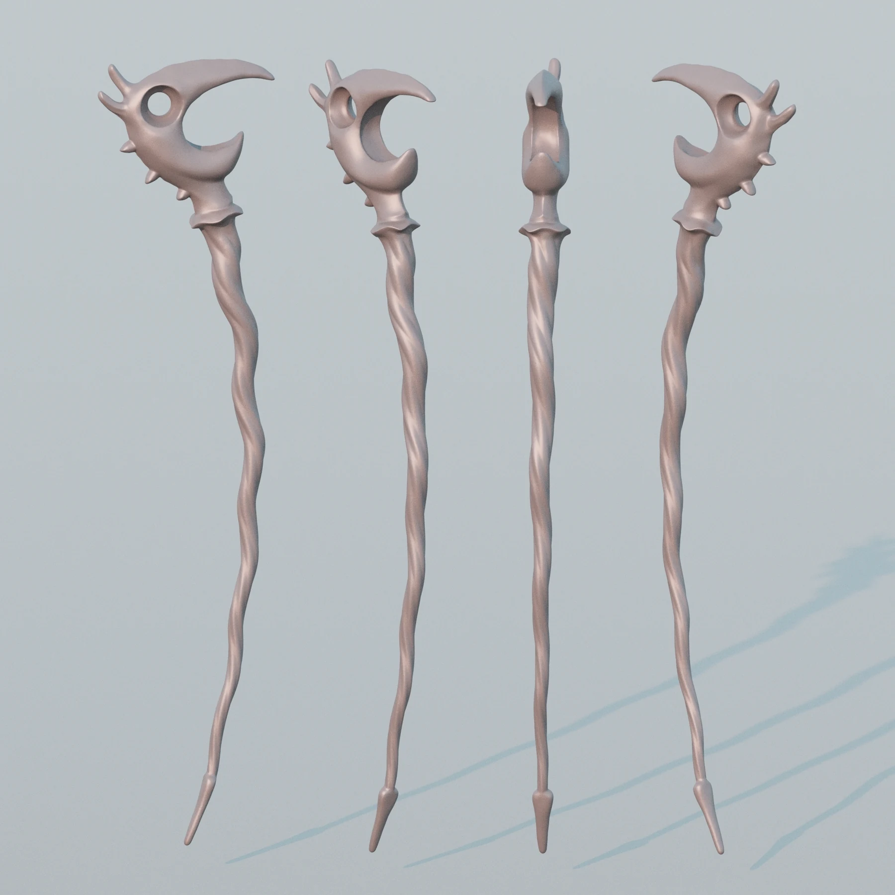 Digital sculpting study showing four pale-gray views of the Dragon Pick before manufacturing.