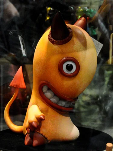 The finished orange Idle Hands prototype displayed inside the Toy Tokyo booth in 2008.