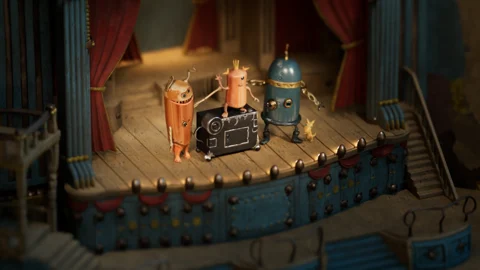 Monster characters performing on an ornate vaudeville stage created by Dylan Sisson.
